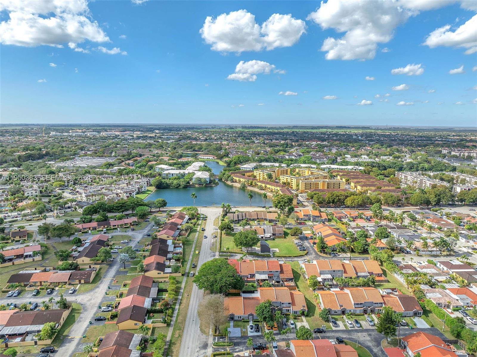 8394 Southwest 148th Avenue, Unit 8394 Miami, FL 33193 - Photo 15 of 15 an aerial view of a city