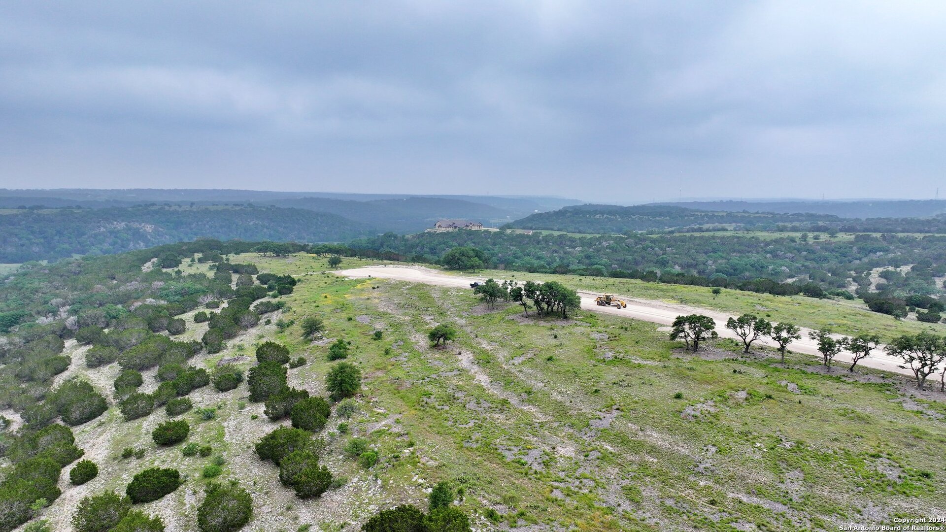Lot 78 Loma Vista Ranch Kerrville, TX 78028 - Photo 5 of 15 an aerial view of a houses with outdoor space
