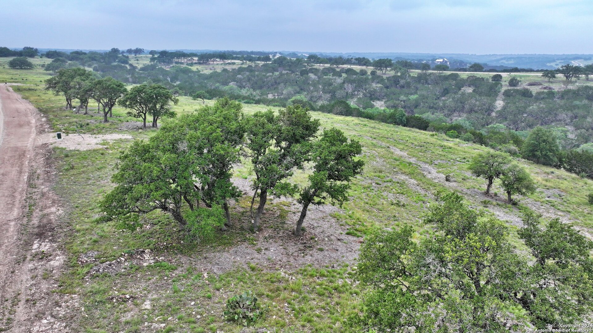 Lot 78 Loma Vista Ranch Kerrville, TX 78028 - Photo 9 of 15 a view of a city with lush green forest