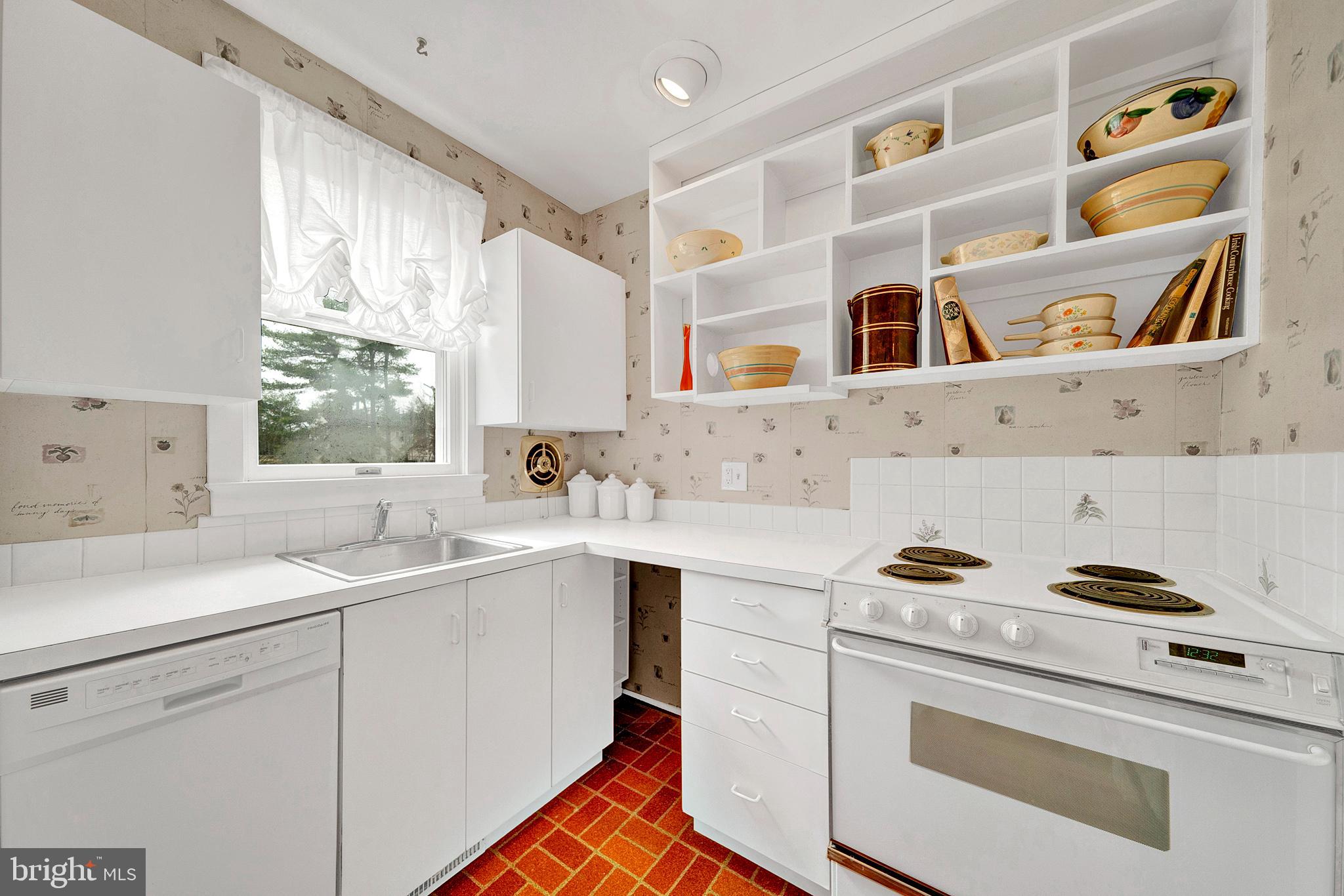 7 Diverty Road Pennington, NJ 08534 - Photo 16 of 45 a kitchen with cabinets appliances a sink and a window