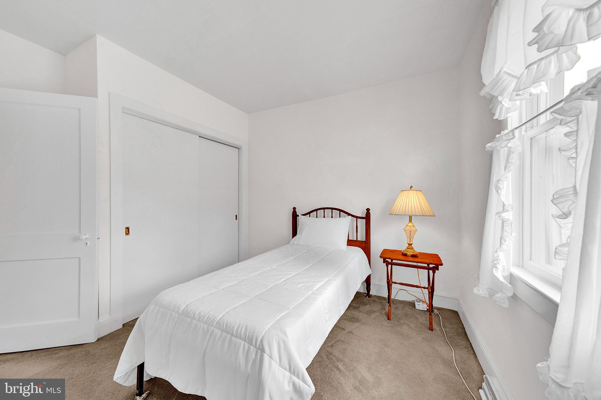 7 Diverty Road Pennington, NJ 08534 - Photo 22 of 45 a bedroom with a bed and a window