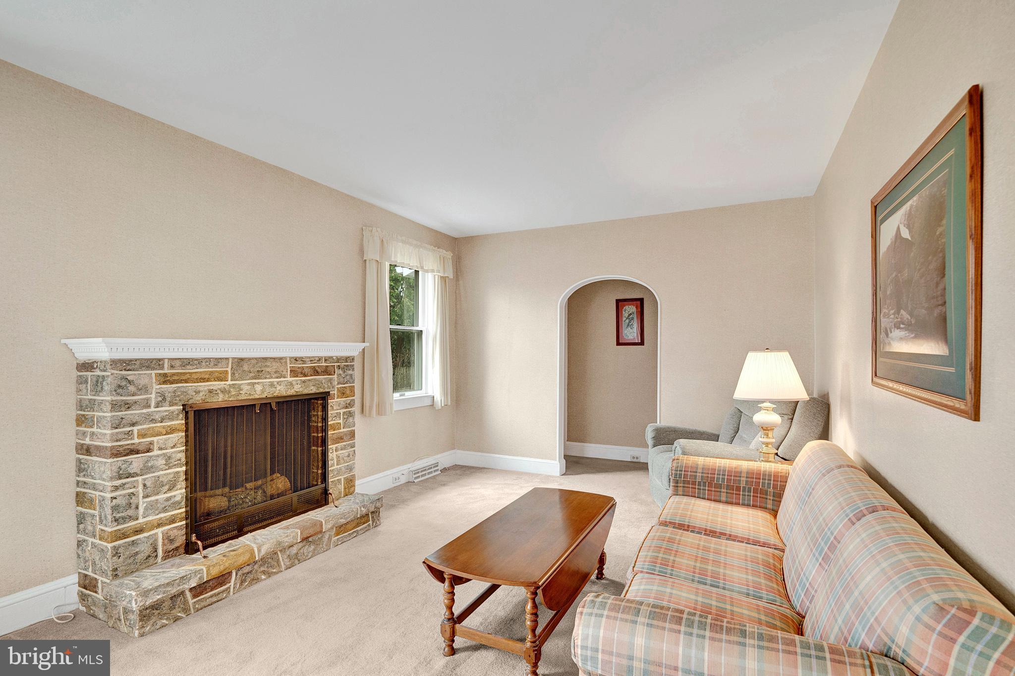 7 Diverty Road Pennington, NJ 08534 - Photo 8 of 45 a bedroom with a bed and a fireplace