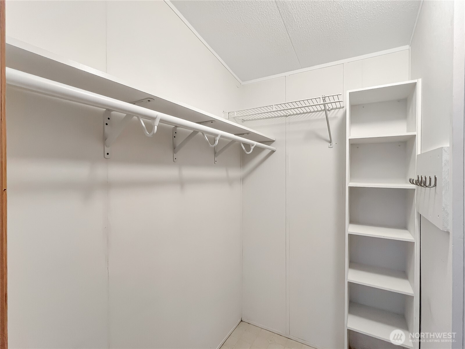 10900 Kuhlman Road Southeast, Unit 54 Olympia, WA 98513 - Photo 8 of 15 a view of an empty walk in closet