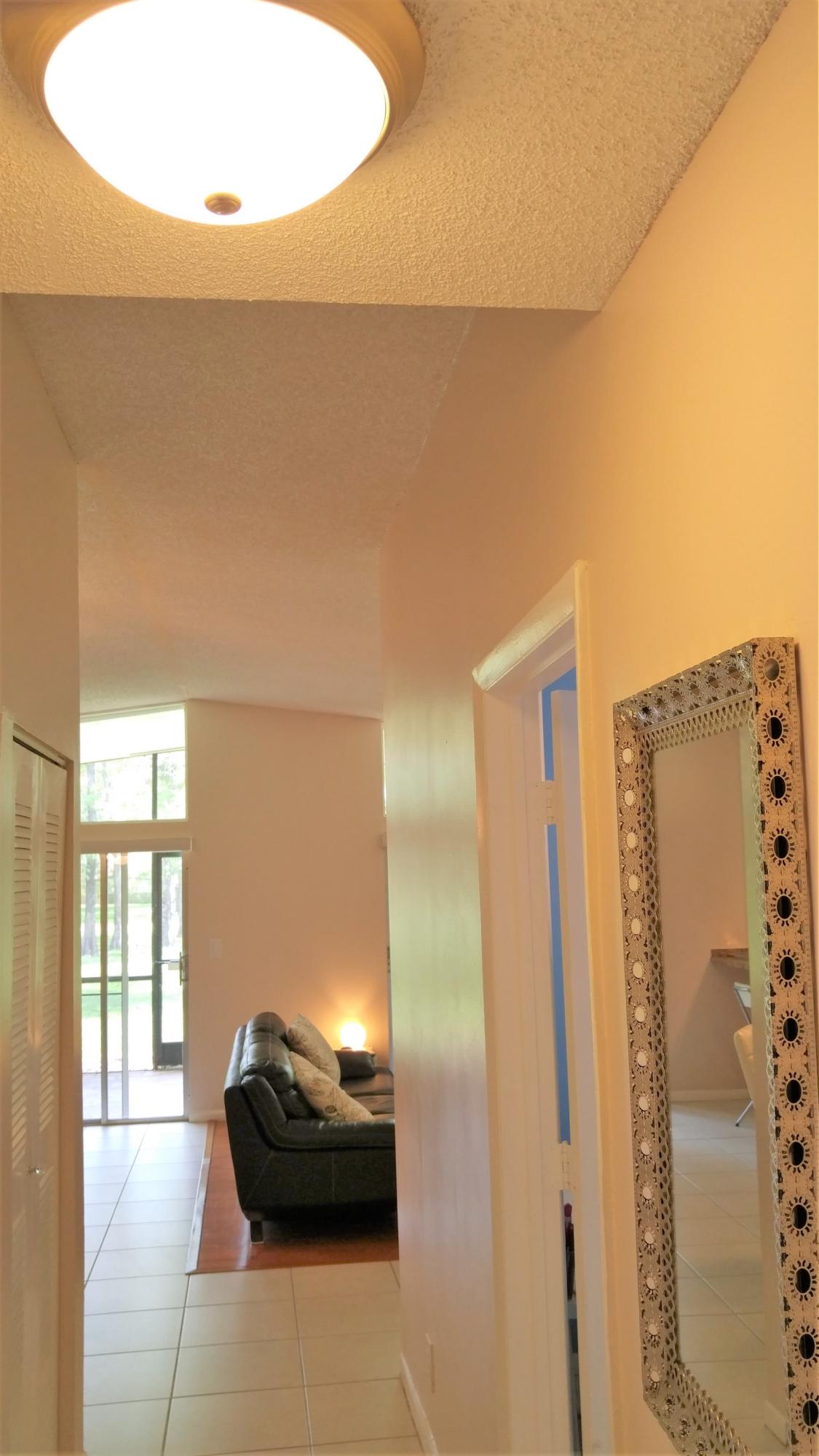 22301 Timberly Drive Boca Raton, FL 33428 - Photo 20 of 32 Hallway out to Living area