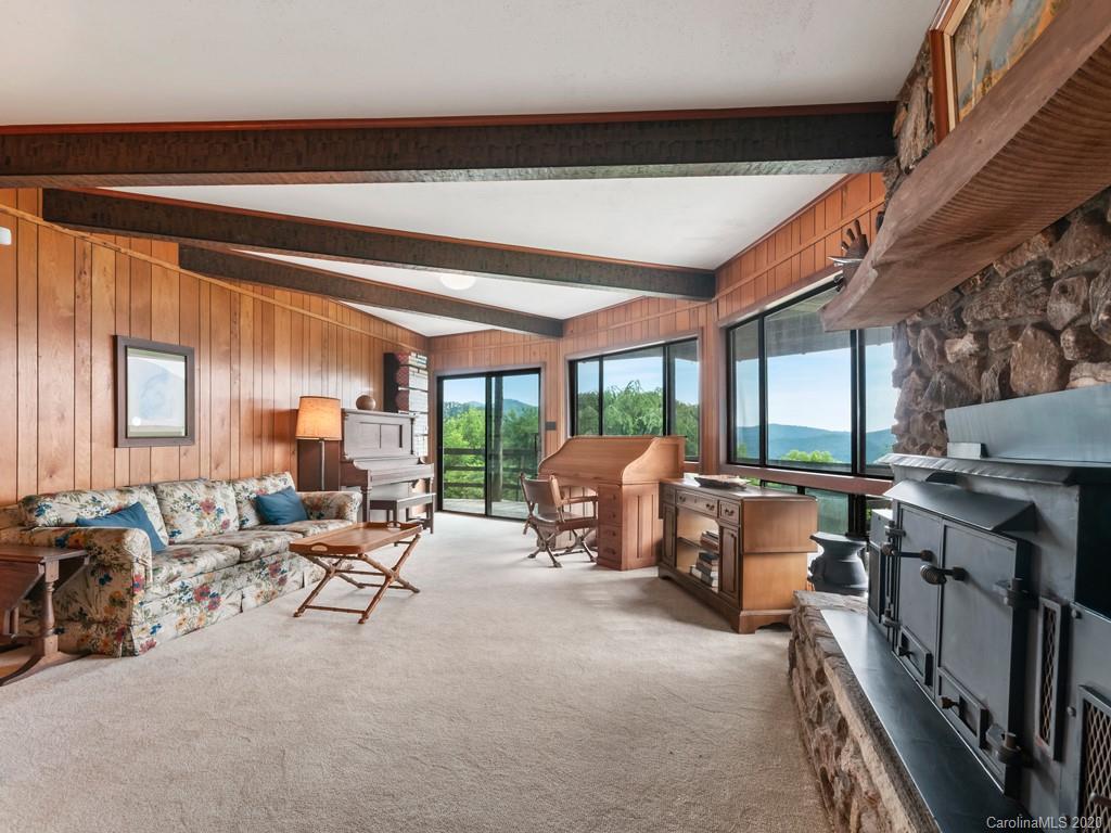 1263 Up Over Road Canton, NC 28716 - Photo 22 of 48 a living room with furniture and a large window