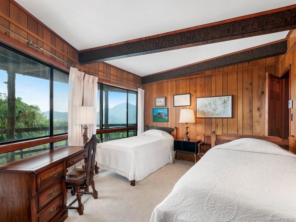 1263 Up Over Road Canton, NC 28716 - Photo 25 of 48 a bedroom with two beds and large window