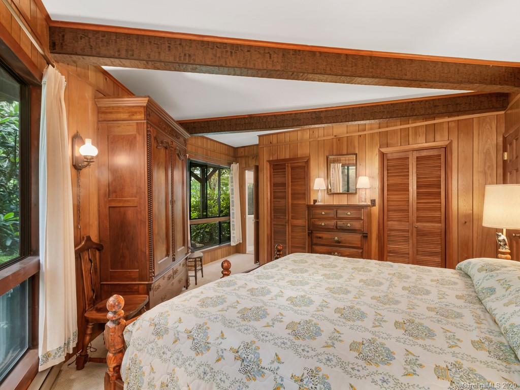 1263 Up Over Road Canton, NC 28716 - Photo 28 of 48 a bedroom with a bed dresser and a large window