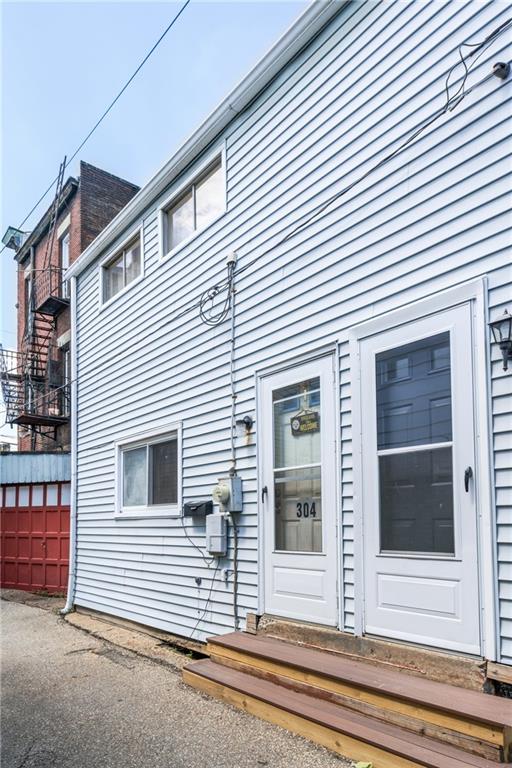 a view of a house with a white door