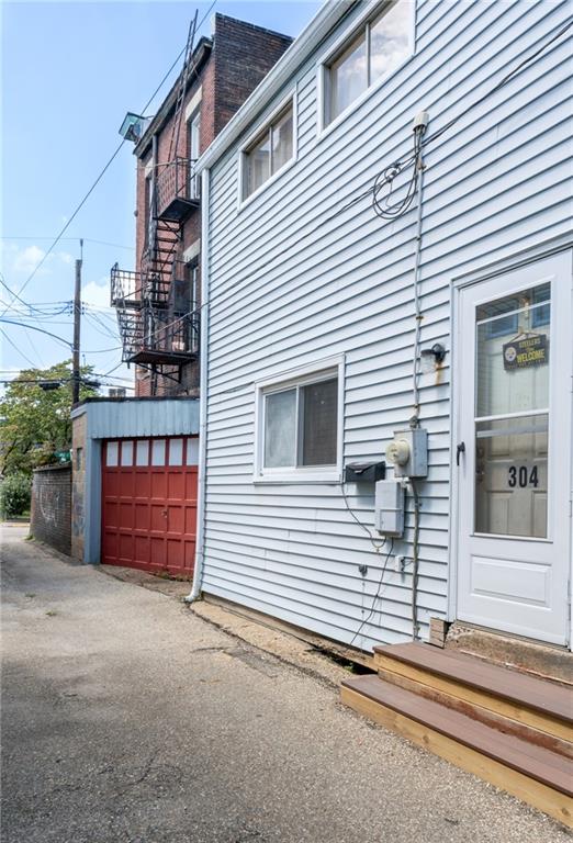 304 Pilgrim Way Pittsburgh, PA 15215 - Photo 5 of 10 a view of a house with a garage