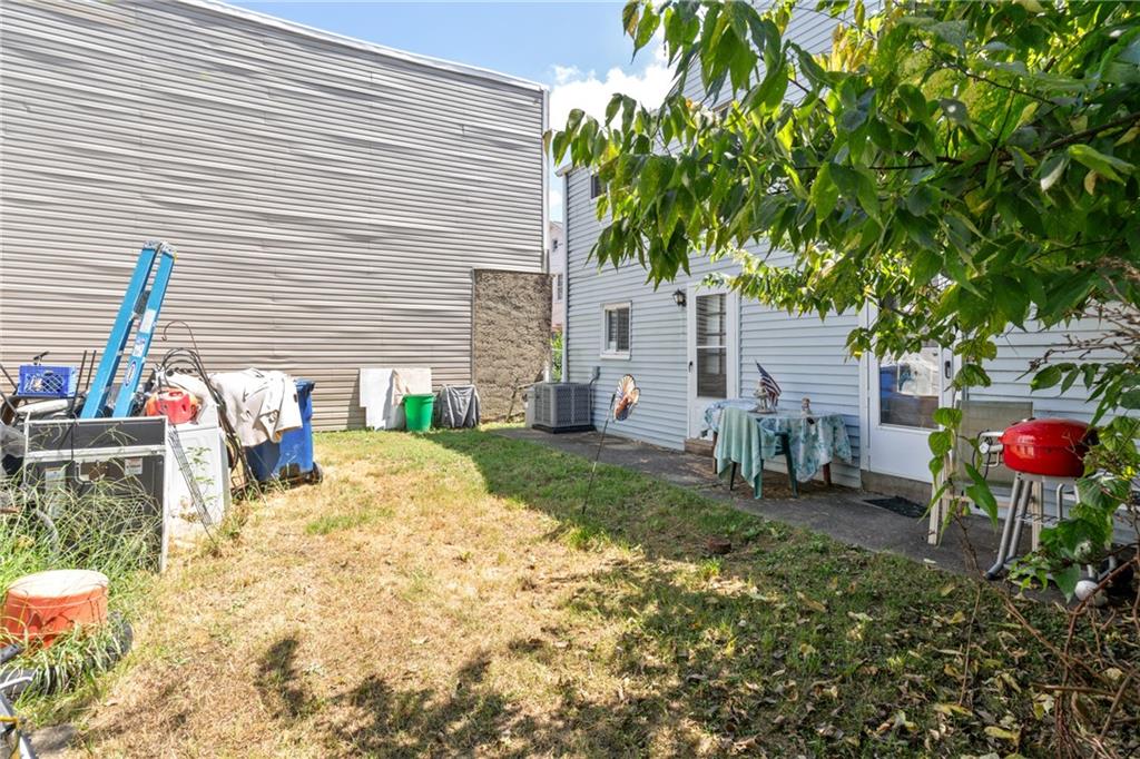 304 Pilgrim Way Pittsburgh, PA 15215 - Photo 9 of 10 a view of a chairs and table in a backyard