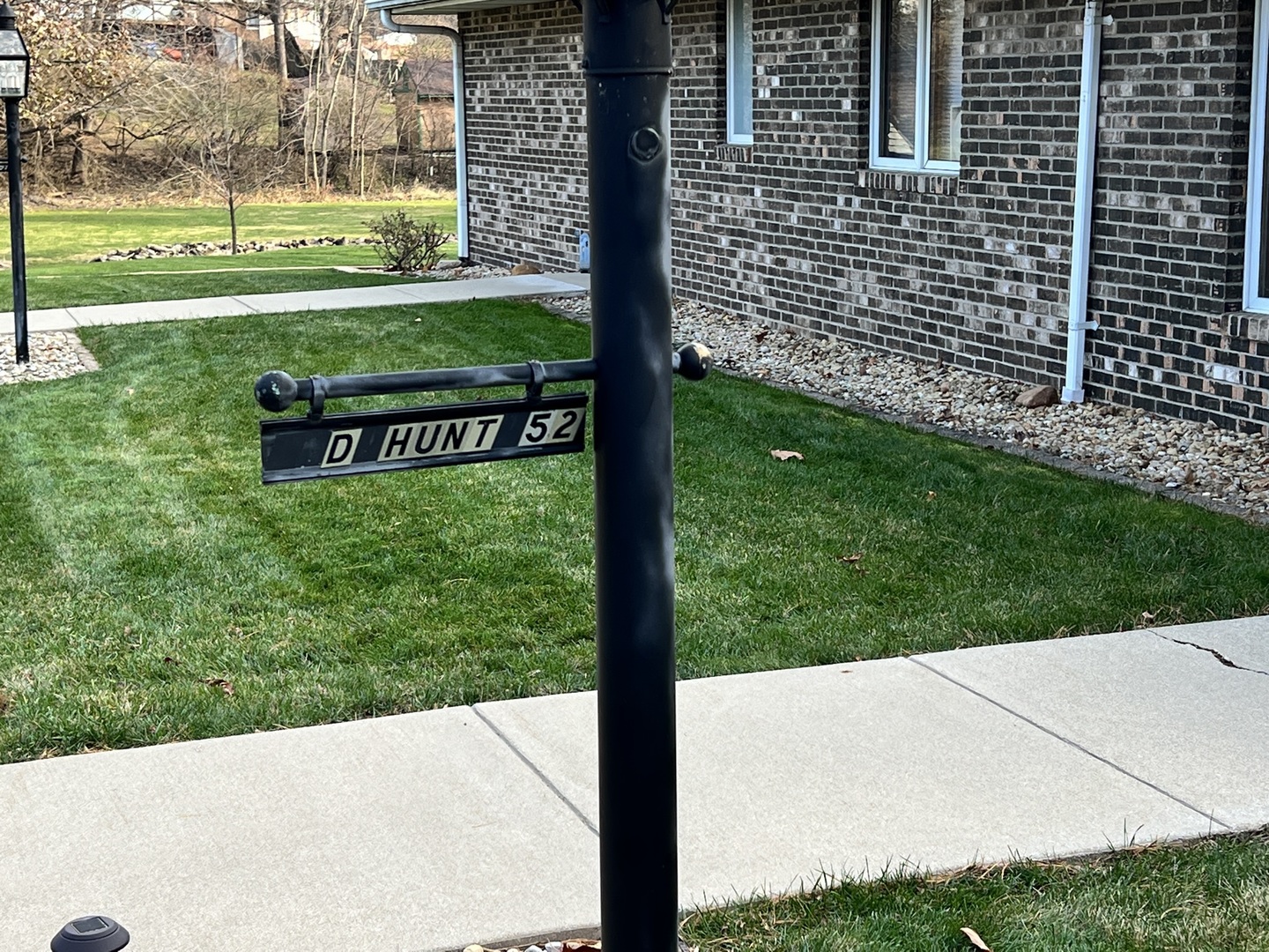 52 Sadowski Court, Unit D Decatur, IL 62521 - Photo 2 of 54 a view of a park with welcome board