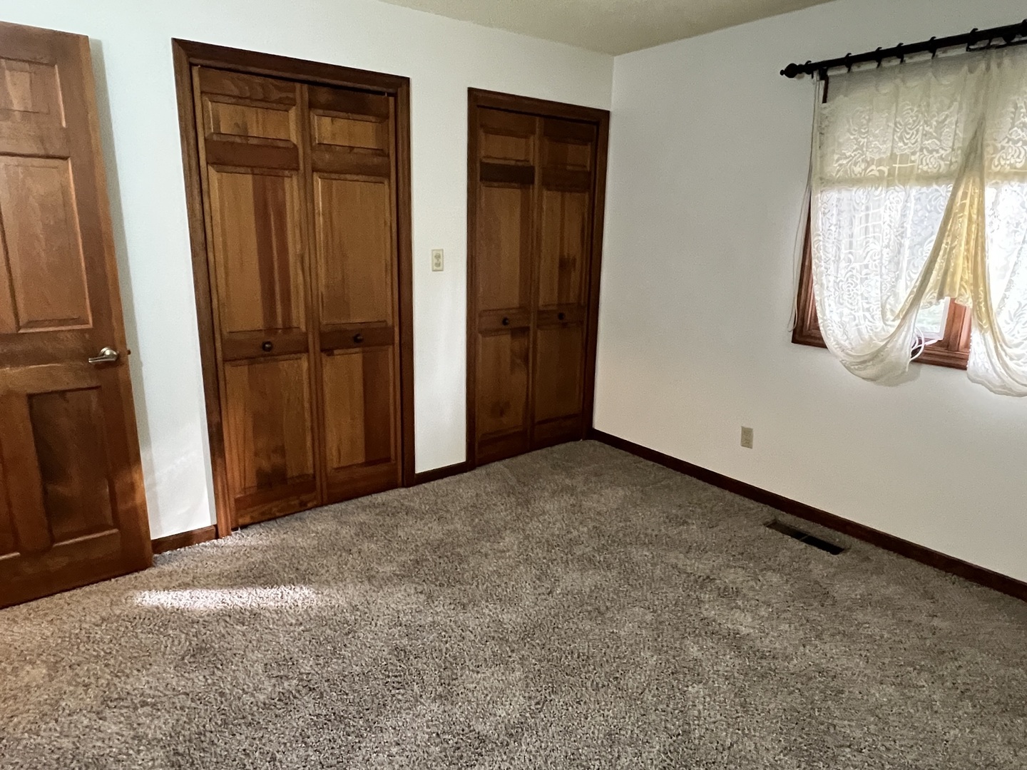 52 Sadowski Court, Unit D Decatur, IL 62521 - Photo 35 of 54 an empty room with windows and closet