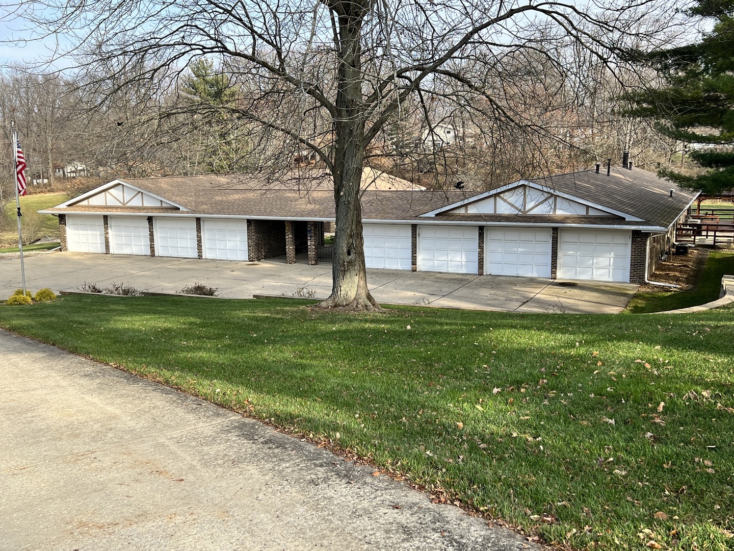 52 Sadowski Court, Unit D Decatur, IL 62521 - Photo 4 of 54 a front view of a house with a garden and trees