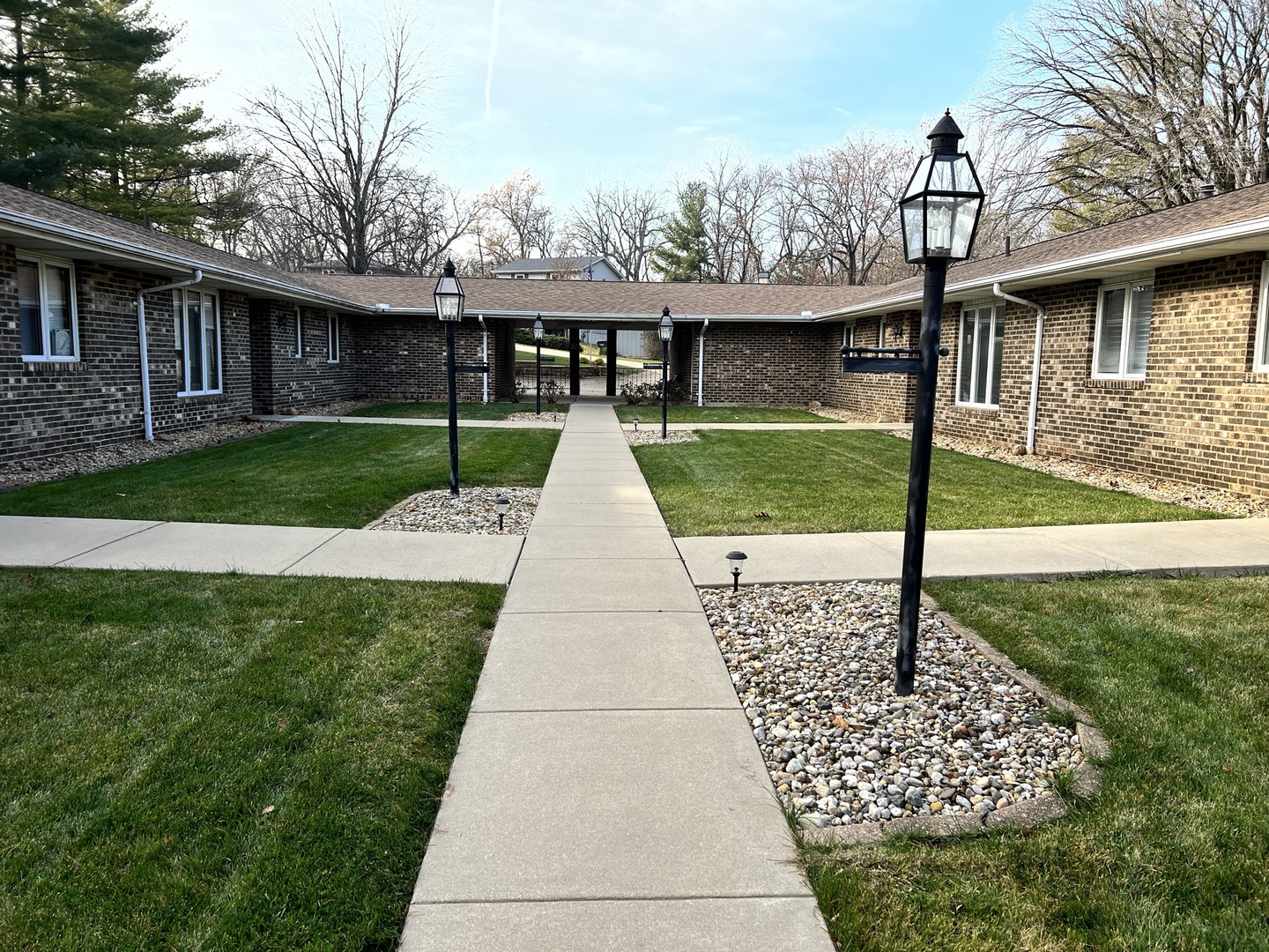 52 Sadowski Court, Unit D Decatur, IL 62521 - Photo 54 of 54 a front view of a house with a yard