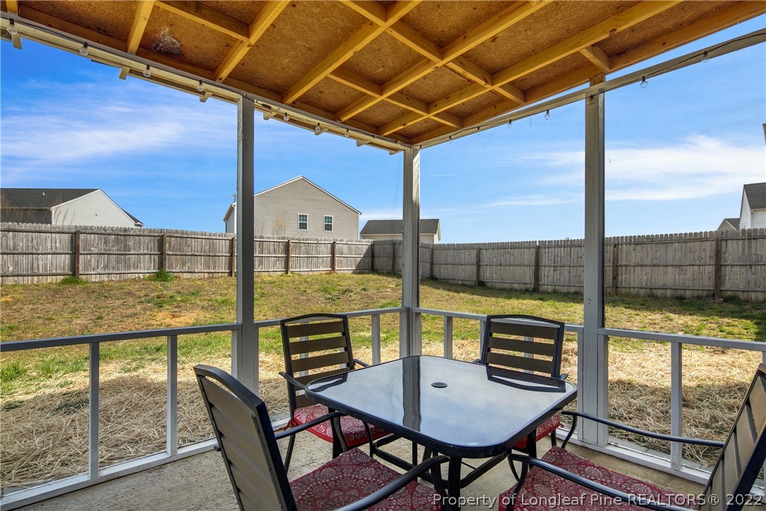 445 Botanical Court Bunnlevel, NC 28323 - Photo 30 of 38 a view of a dining room with furniture window and outside view