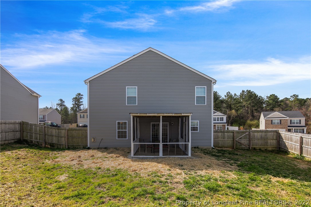 445 Botanical Court Bunnlevel, NC 28323 - Photo 32 of 38 a house view with a backyard