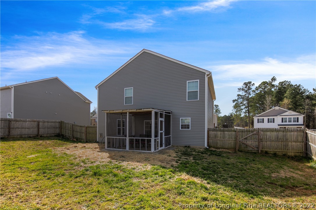445 Botanical Court Bunnlevel, NC 28323 - Photo 33 of 38 a house view with a garden space