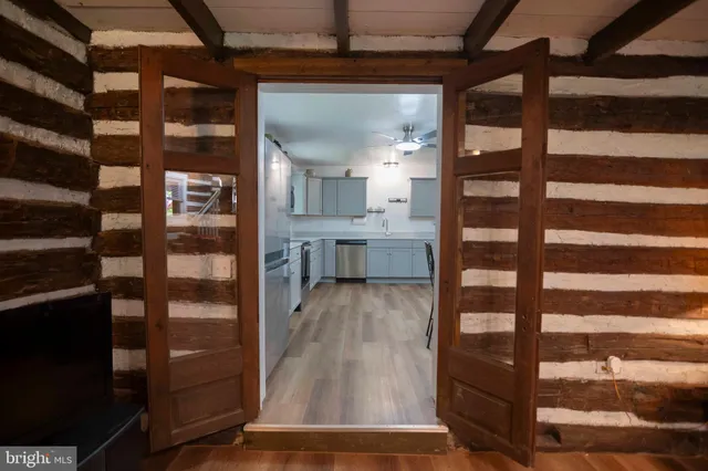 a view of livingroom with furniture and staircase