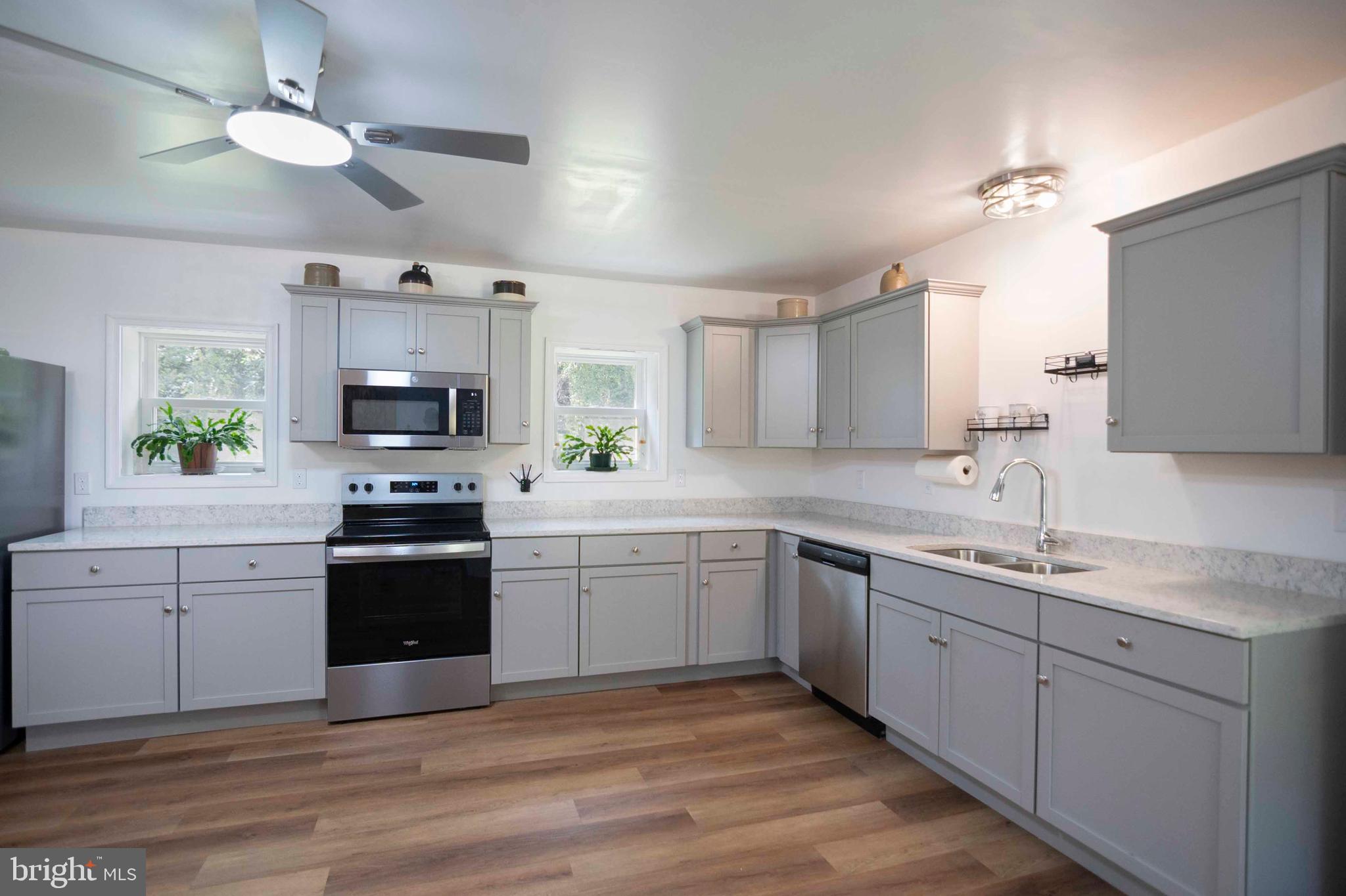 2002 Balkamore Hill Road Stanley, VA 22851 - Photo 22 of 45 a kitchen with a sink appliances and cabinets