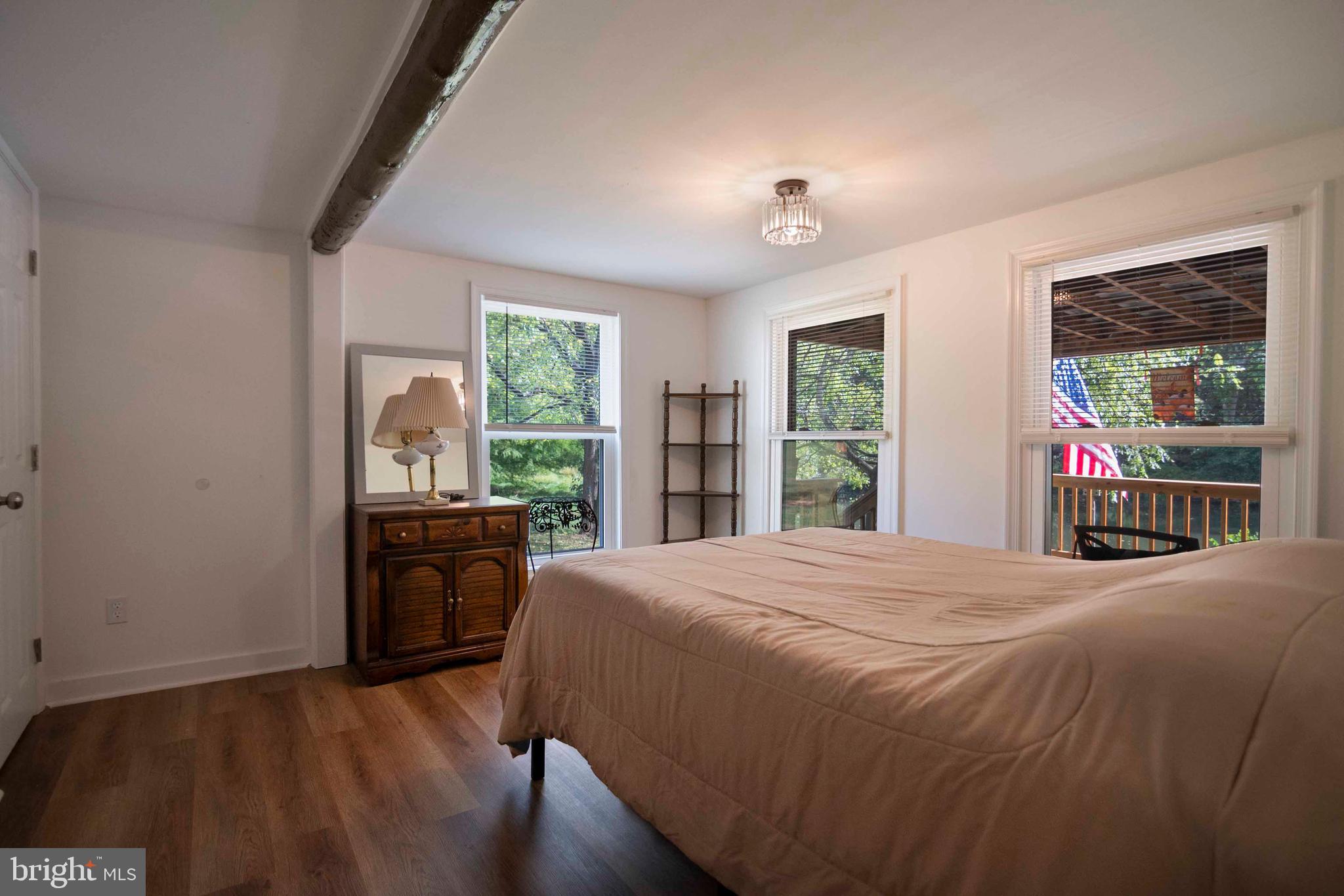 2002 Balkamore Hill Road Stanley, VA 22851 - Photo 26 of 45 a bedroom with a bed and a large window