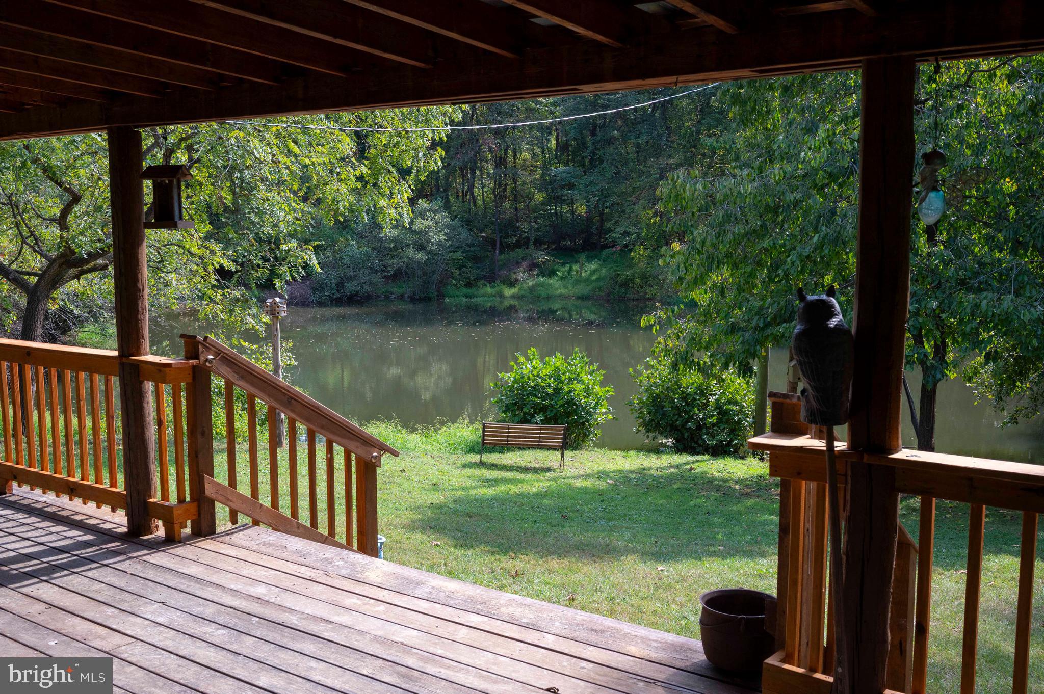 2002 Balkamore Hill Road Stanley, VA 22851 - Photo 3 of 45 a view of a backyard with wooden floor and outdoor seating