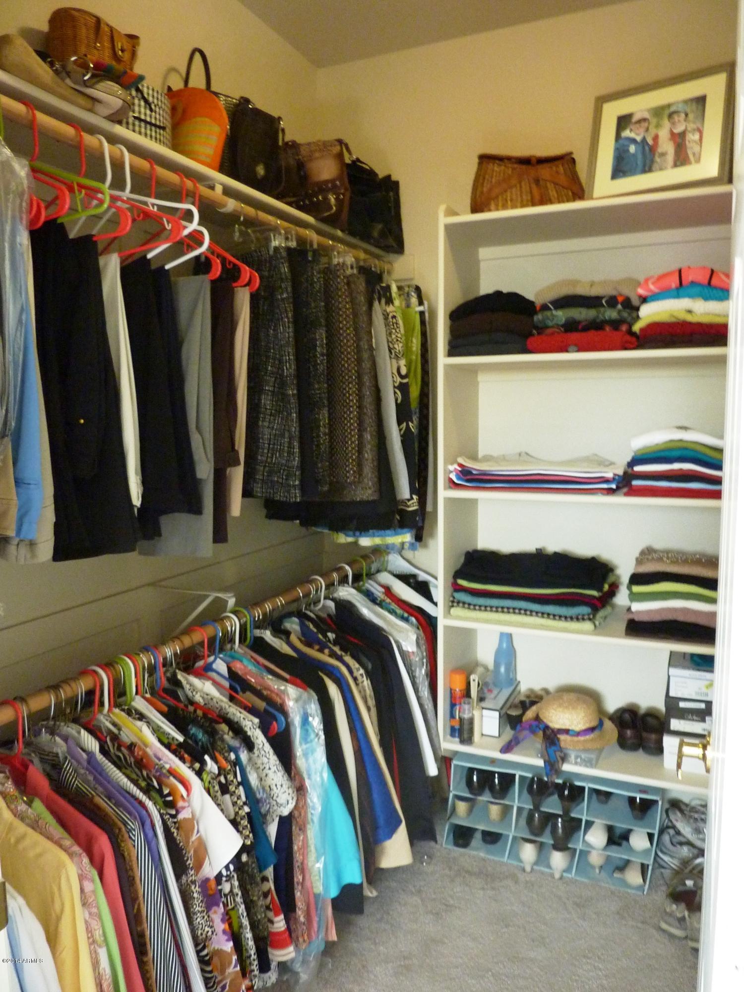 1445 East Broadway Road, Unit 110 Tempe, AZ 85282 - Photo 11 of 31 Upstairs Bedroom 2 Walk-in Closet