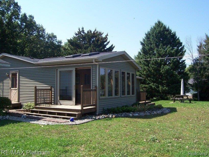 20550 North Lake Road Gregory, MI 48137 - Photo 10 of 13 nl_3_season_room_exterior