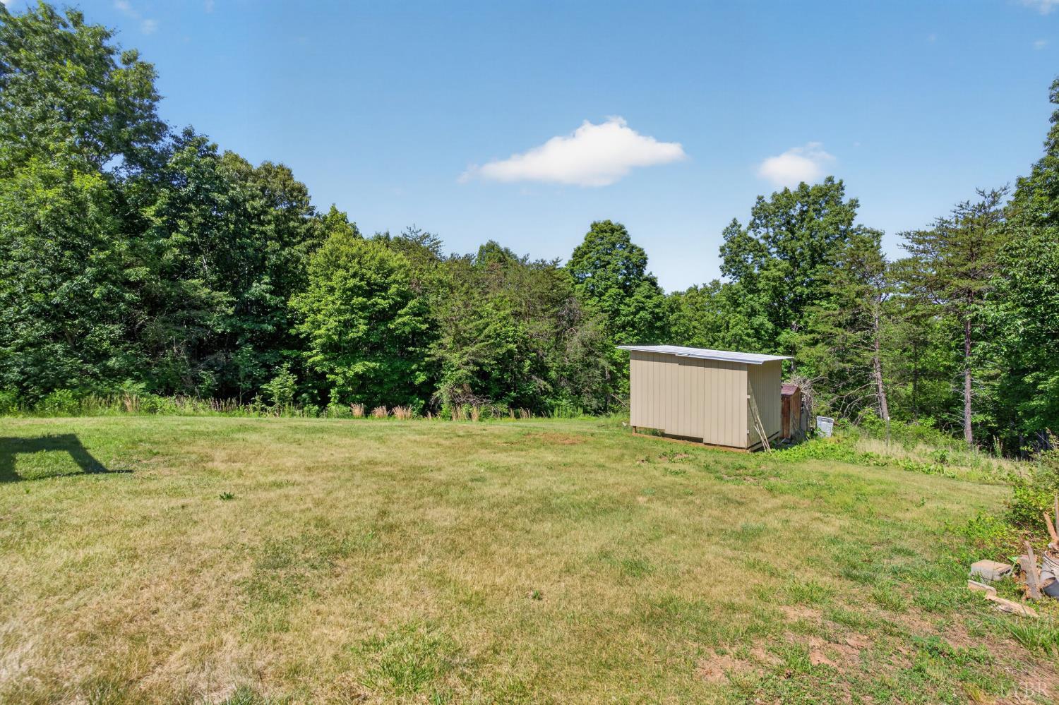 1811 Mohawk Road Gladys, VA 24554 - Photo 33 of 51 a view of a big yard with large trees