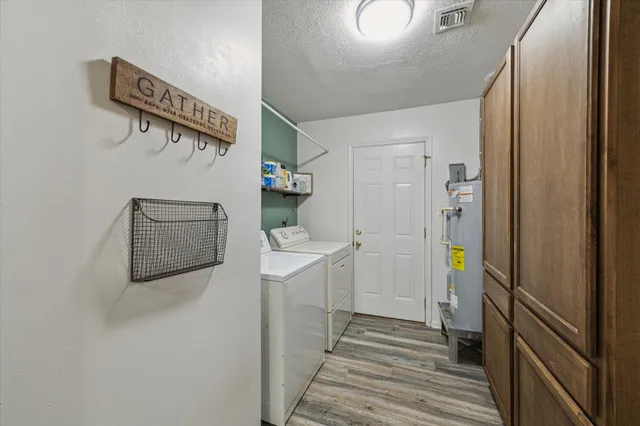 a view of yard with patio