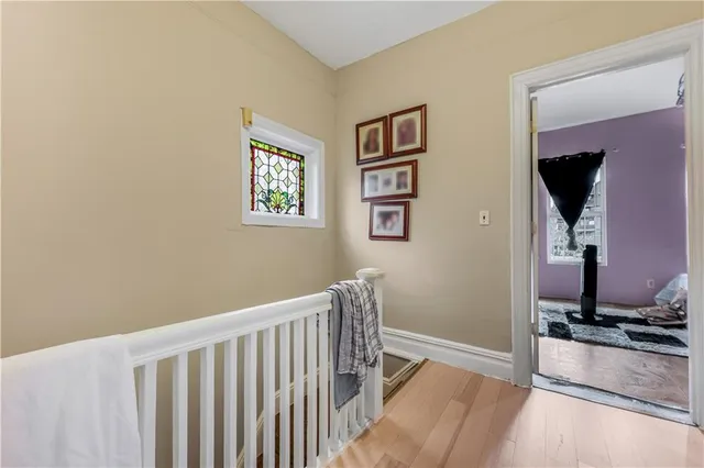a view of a hallway with a bedroom