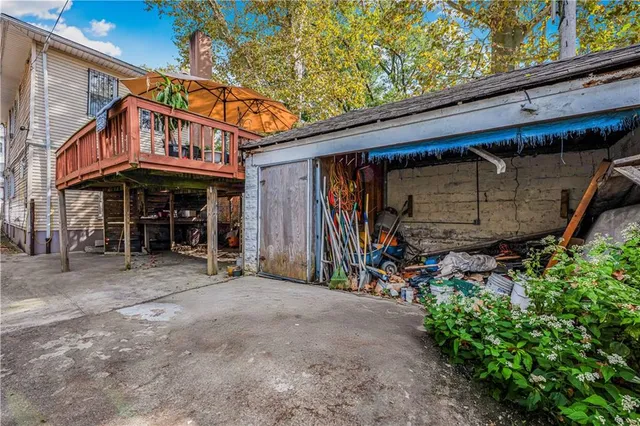 a view of a car park in front of shop