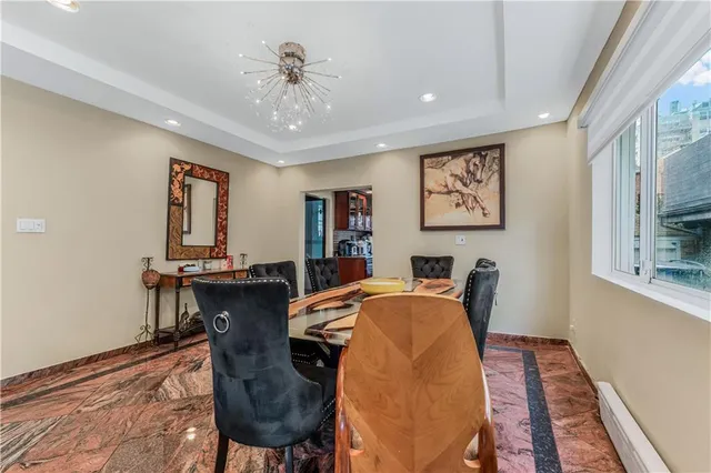 a view of a dining room with furniture