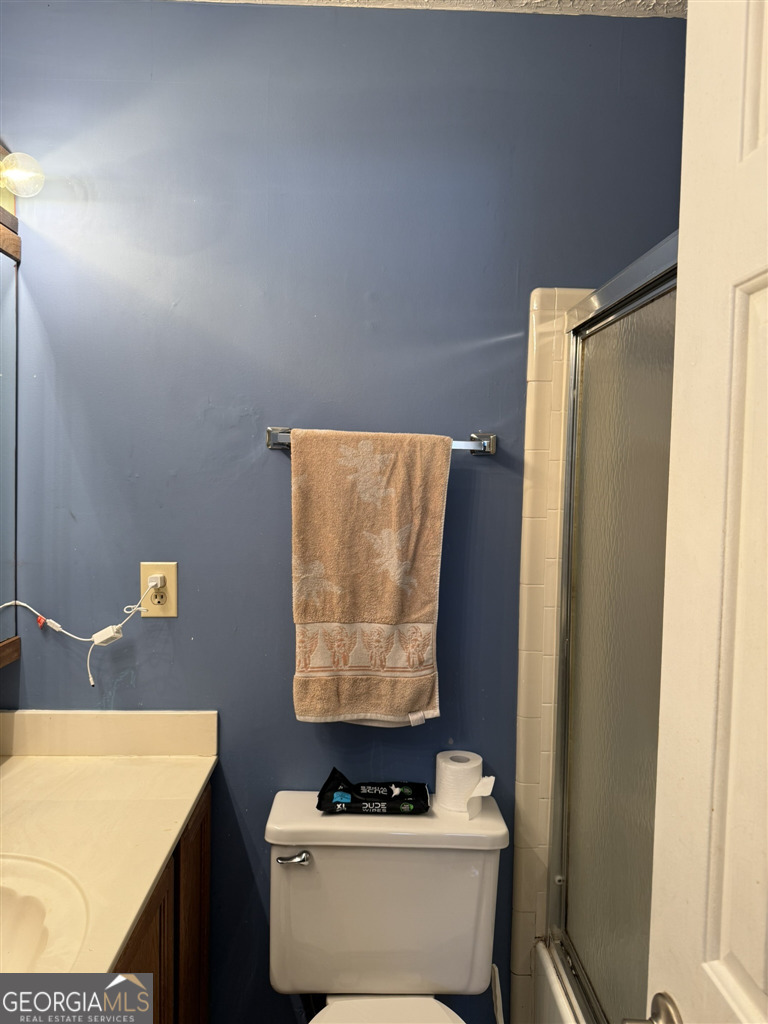 3994 Elm Street Atlanta, GA 30341 - Photo 8 of 15 a bathroom with a sink and a mirror