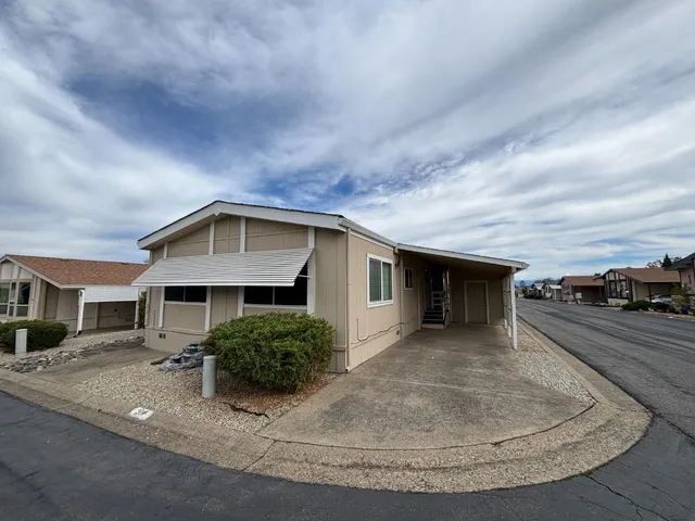a view of a house with a patio