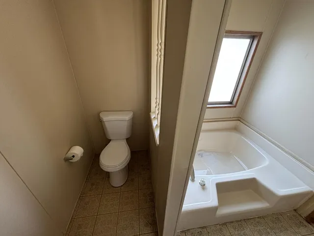 a bathroom with a toilet