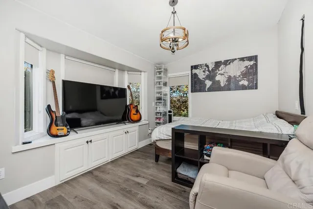 a bathroom with double vanity sink and a mirror