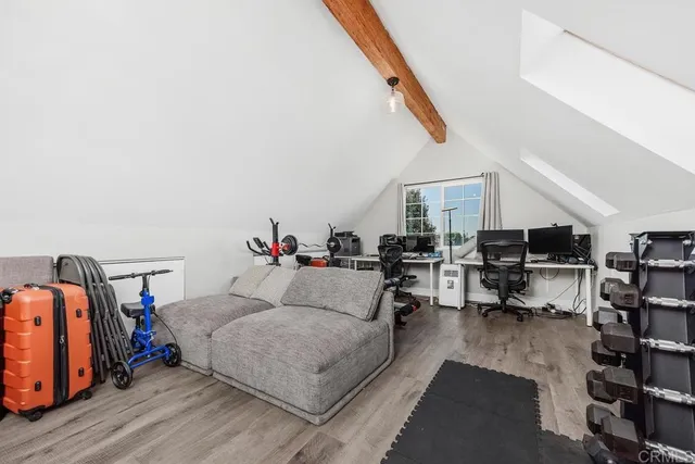 a spacious en suite bathroom with a double vanity sink and a mirror