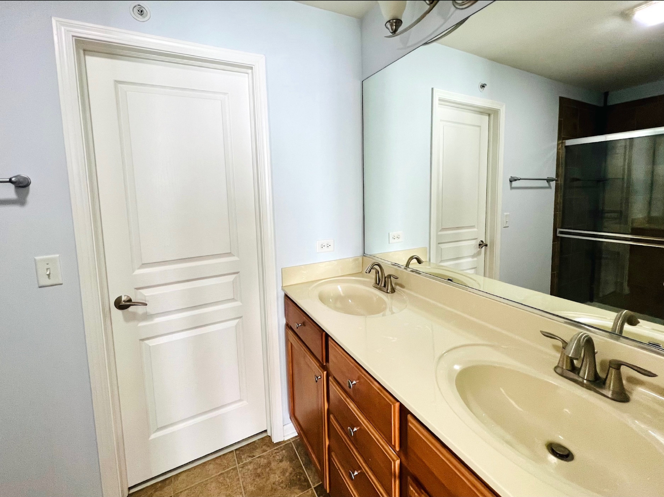 17 East Willow Road, Unit 17 Wheeling, IL 60090 - Photo 15 of 22 a bathroom with a sink and a mirror