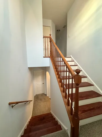 a view of entryway with wooden floor