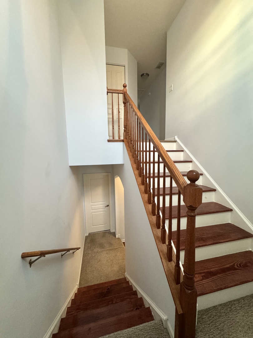 17 East Willow Road, Unit 17 Wheeling, IL 60090 - Photo 17 of 22 a view of entryway with wooden floor