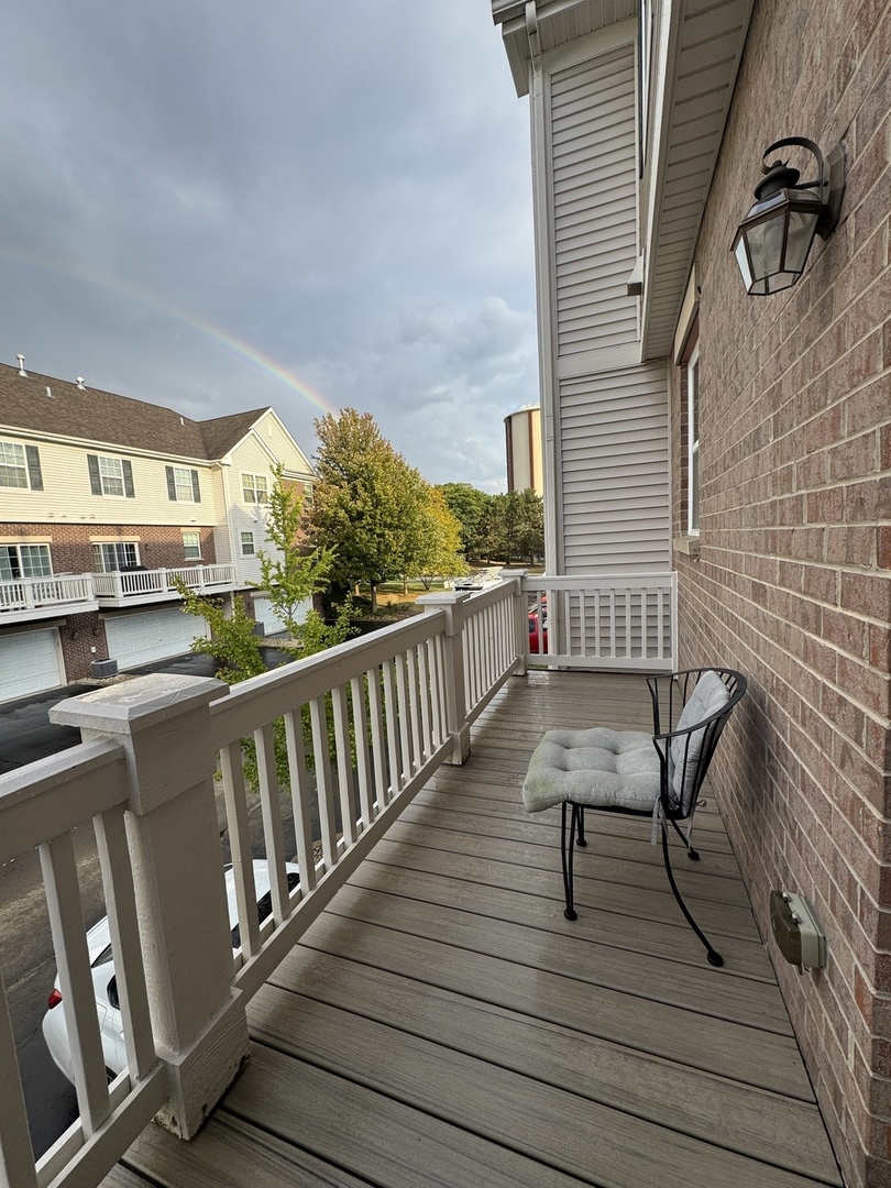 17 East Willow Road, Unit 17 Wheeling, IL 60090 - Photo 19 of 22 a view of a balcony with chairs