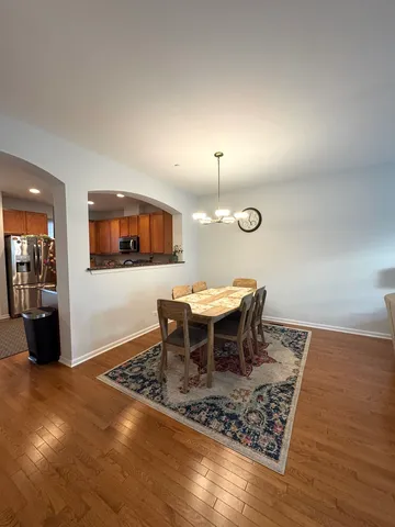 a view of a dining room with furniture