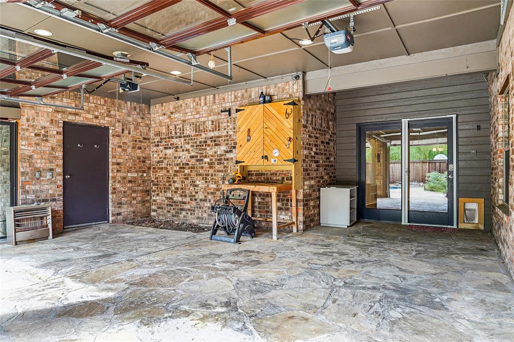2121 Fairfax Road Denton, TX 76205 - Photo 30 of 40 Pation encloses with 2 garage doors