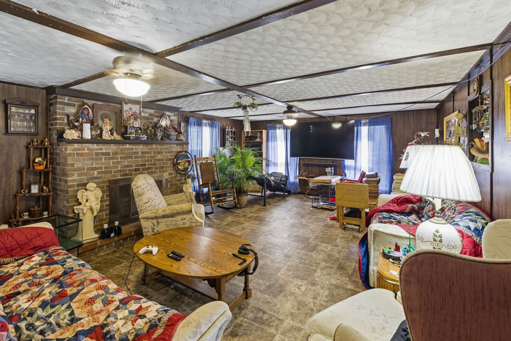 207 Center Street Portland, TN 37148 - Photo 3 of 24 a living room with furniture and a flat screen tv