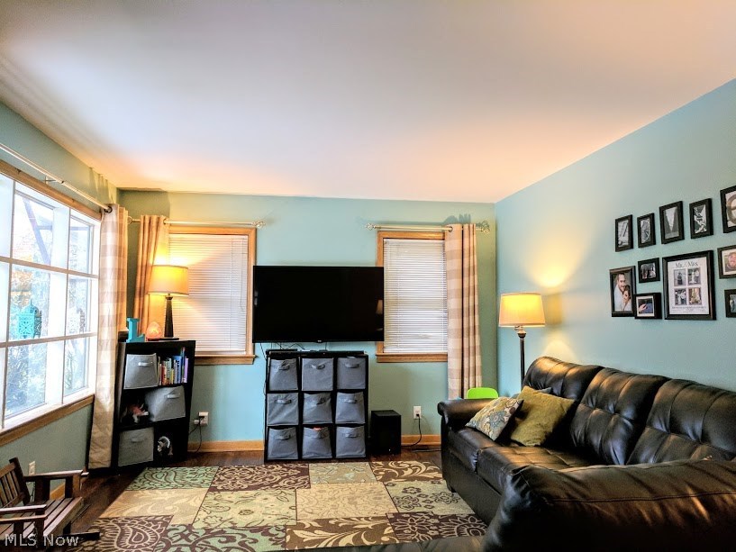 2320 Copley Road Akron, OH 44320 - Photo 2 of 35 Living room is open to the dining room and features beautiful wood floors!