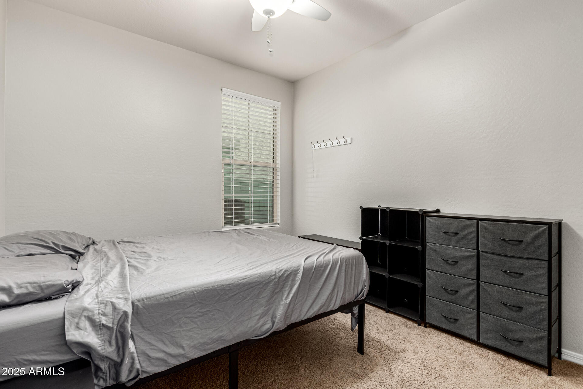3135 East Ridgewood Lane Gilbert, AZ 85298 - Photo 23 of 39 a bedroom with a bed and a window