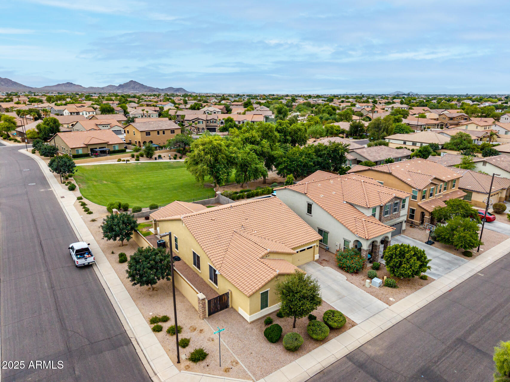 3135 East Ridgewood Lane Gilbert, AZ 85298 - Photo 31 of 39 an aerial view of a house with a garden