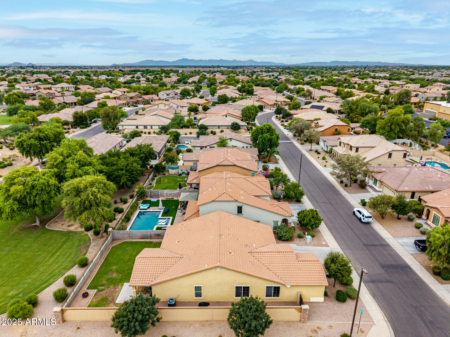 3135 East Ridgewood Lane Gilbert, AZ 85298 - Photo 32 of 39 an aerial view of residential houses with outdoor space
