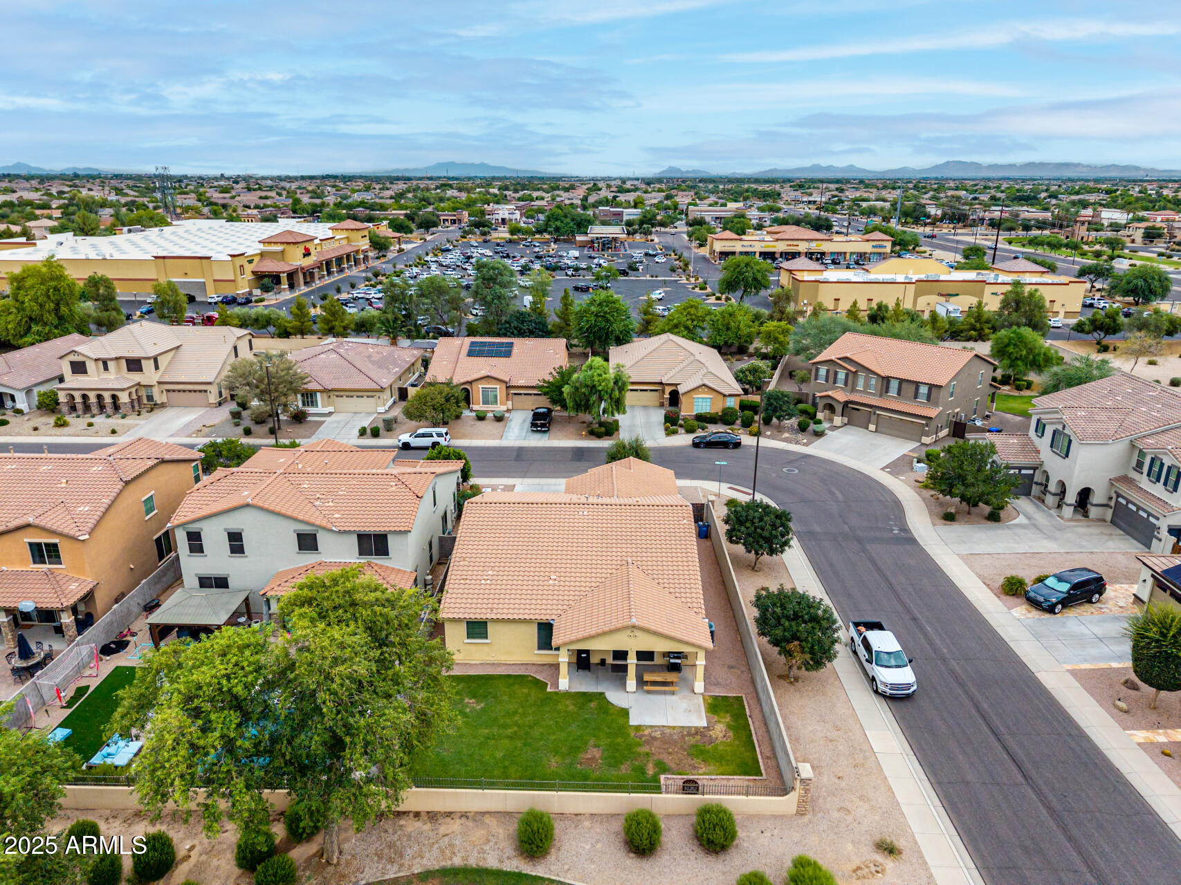 3135 East Ridgewood Lane Gilbert, AZ 85298 - Photo 35 of 39 an aerial view of a house with outdoor space