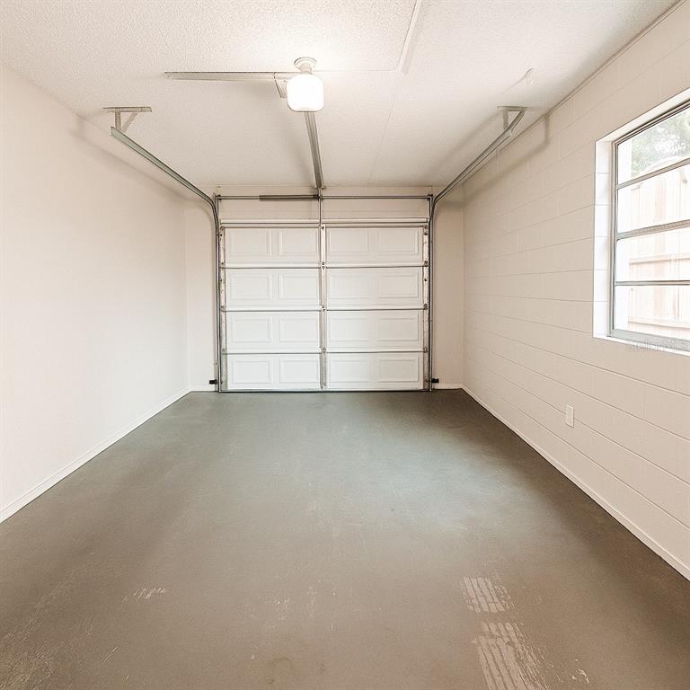 3208 Timberline Road Winter Haven, FL 33880 - Photo 14 of 21 an empty room with a empty space and windows